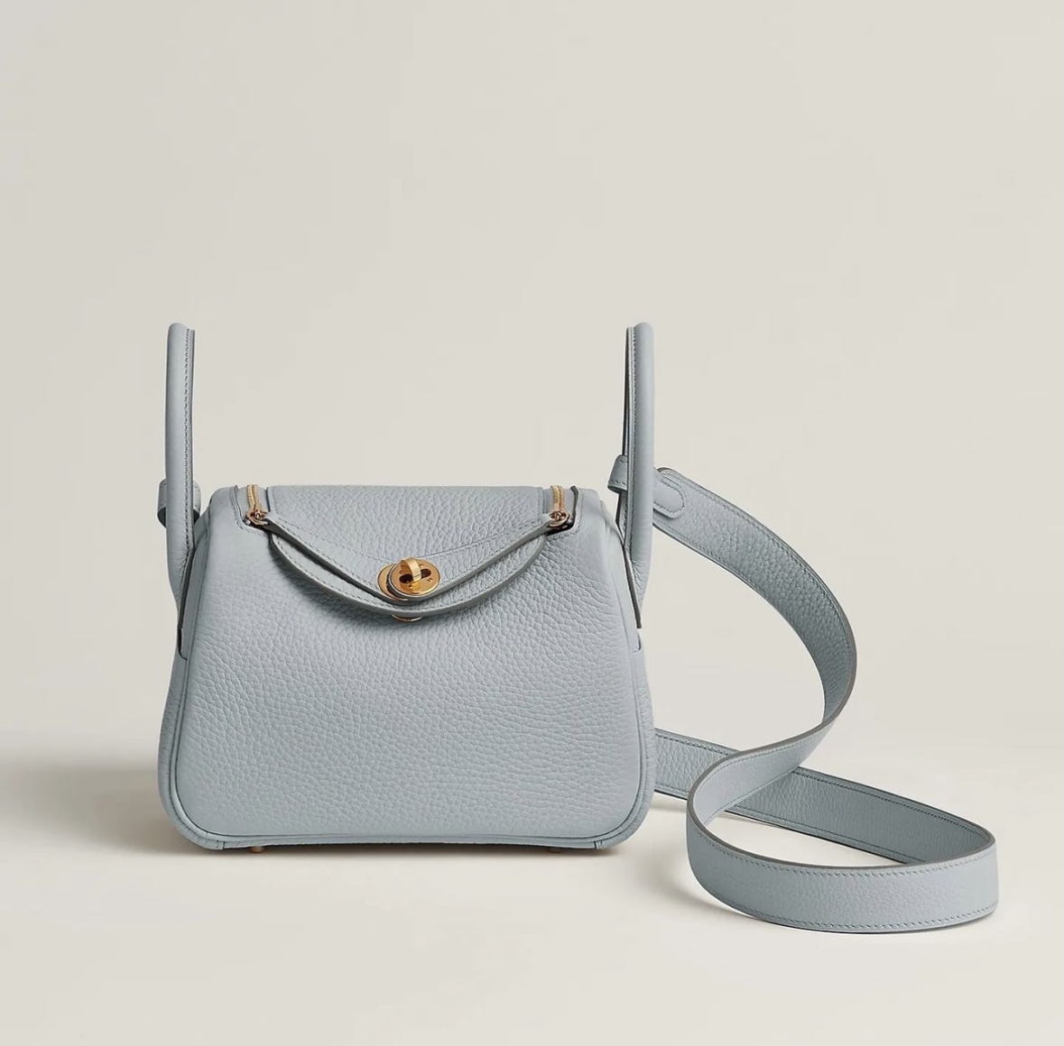 Hermès price and pictures Lindy mini bag CC08 Bleu Pale Clemence