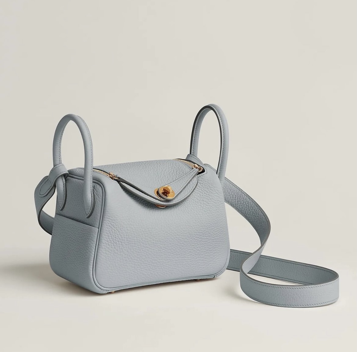 Hermès price and pictures Lindy mini bag CC08 Bleu Pale Clemence