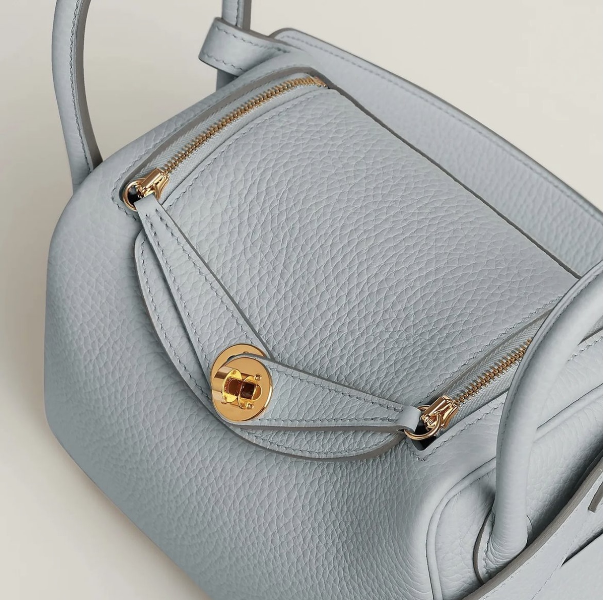 Hermès price and pictures Lindy mini bag CC08 Bleu Pale Clemence