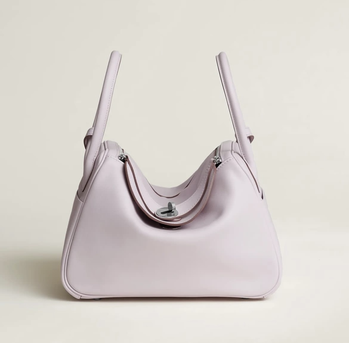 愛馬仕中國官方旗艦店 Hermès Lindy 26 verso bag Mauve Pâle / Gold Swift