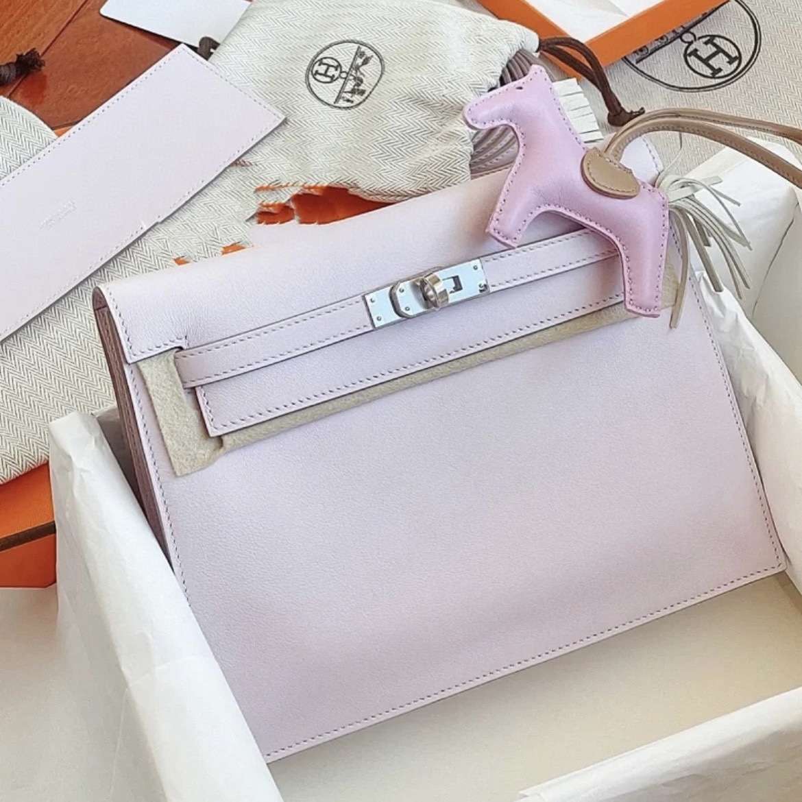 kelly danse價錢香港 Hermès Kelly danse Swift Mauve Pale 夢幻粉紫